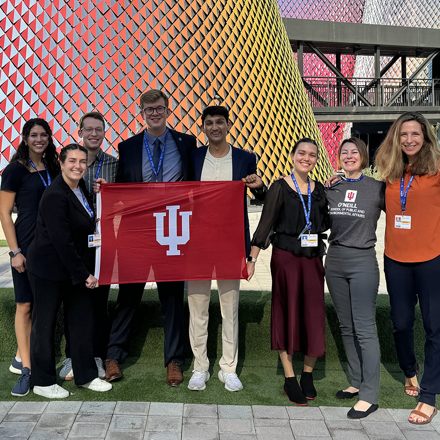 Four headshots in a block